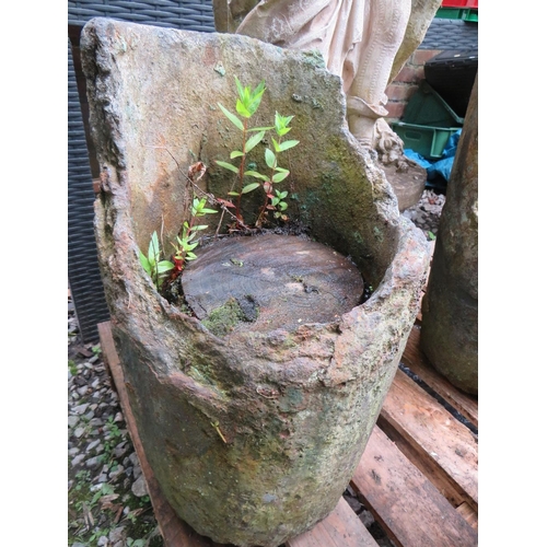 714 - A CONCRETE STATUE ON PLINTH AND THREE RUSTIC CONCRETE PLANTERS