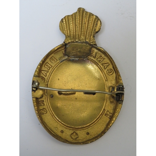 211 - A VICTORIAN ROYAL CANADIAN DRAGOONS HELMET PLATE CENTRE BADGE, with later brooch fitting and a small... 