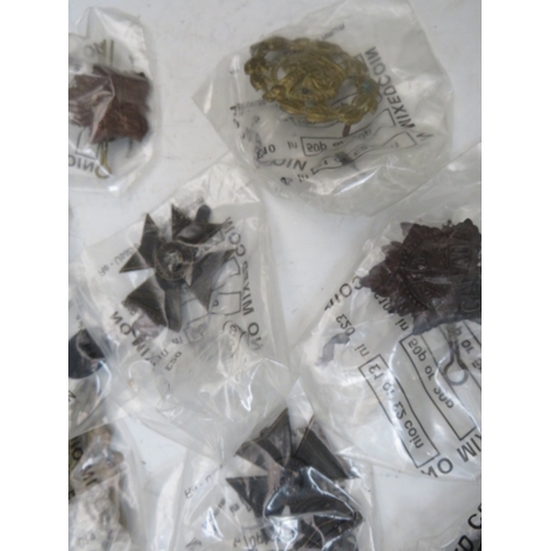 212 - A QUANTITY OF ASSORTED MILITARY BADGES ETC., to include Fusiliers & Scottish types