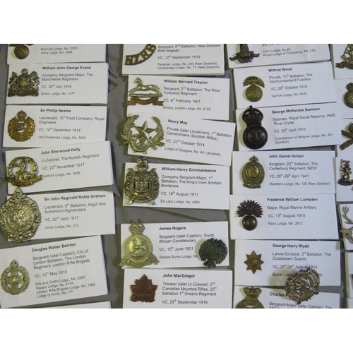 214 - A COLLECTION OF ASSORTED MILITARY BADGES, mainly WW1 and WW2 types, mostly re-strikes (80+)