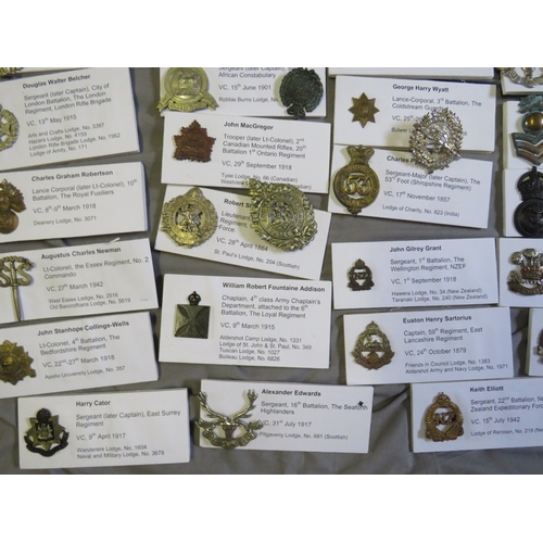 214 - A COLLECTION OF ASSORTED MILITARY BADGES, mainly WW1 and WW2 types, mostly re-strikes (80+)