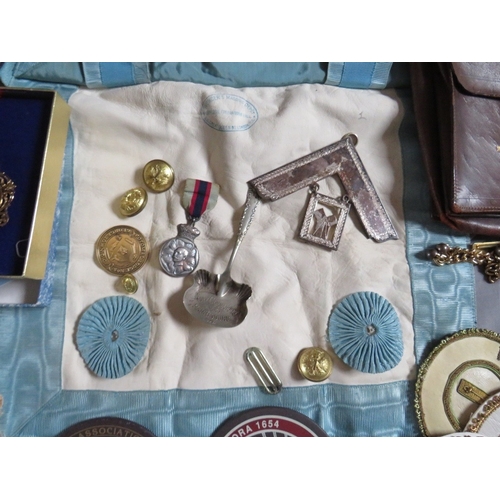233 - A COLLECTION OF VINTAGE MASONIC REGALIA, to include badges, pouches, apron etc.
