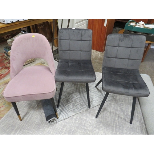 834 - THREE MODERN UPHOLSTERED DINING CHAIRS