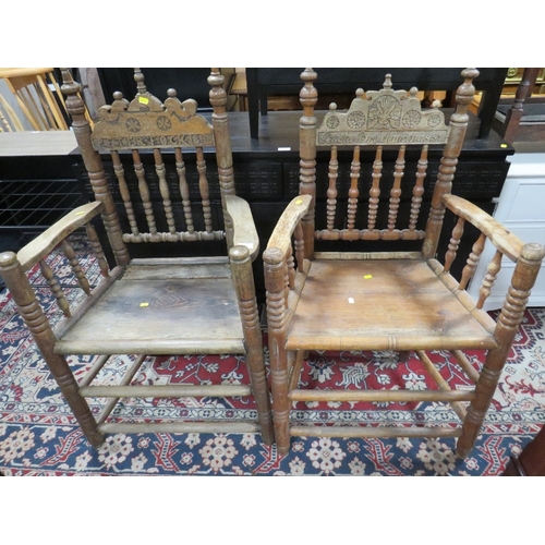 837 - A PAIR OF ANTIQUE CARVED OAK ARMCHAIRS