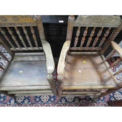 837 - A PAIR OF ANTIQUE CARVED OAK ARMCHAIRS