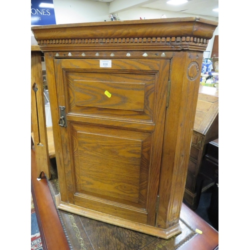 838 - AN ANTIQUE OAK HANGING CORNER CUPBOARD WITH MOTHER-OF-PEARL INLAY