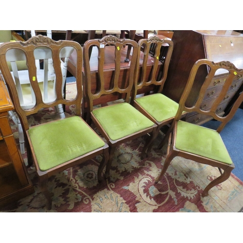 855 - A SET OF FOUR FRENCH STYLE OAK CHAIRS