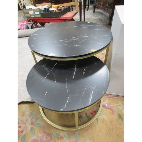 865 - A MODERN CIRCULAR COFFEE TABLE TOGETHER WITH A SMALLER TABLE FAUX MARBLE TOPS