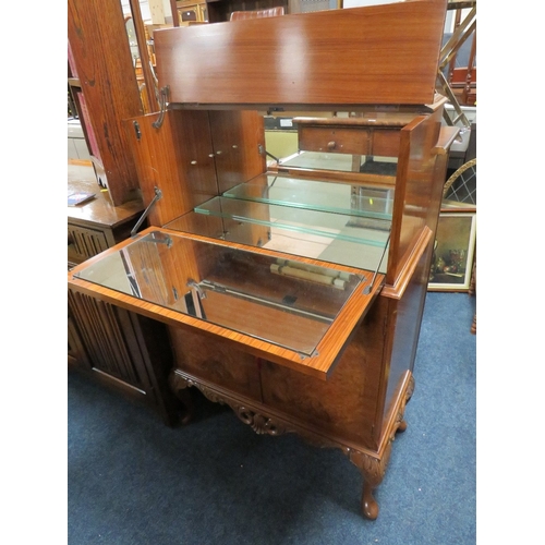 877 - A VINTAGE WALNUT DRINKS CABINET