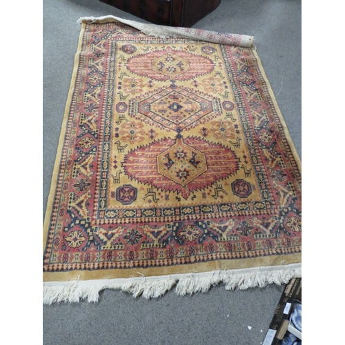 881 - A 20TH CENTURY WOOLLEN RUG DIMENSIONS   170 X 120 CM