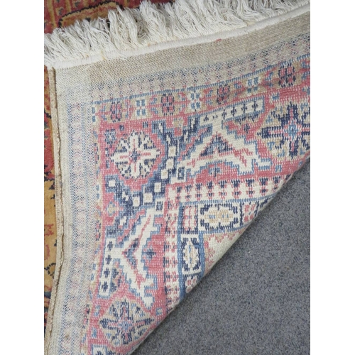 881 - A 20TH CENTURY WOOLLEN RUG DIMENSIONS   170 X 120 CM