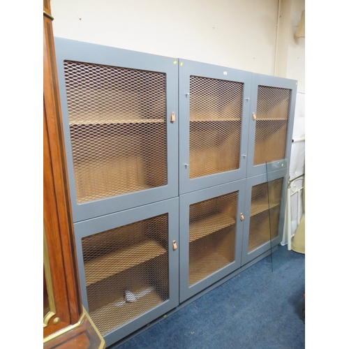 908 - A MODERN LARGE THREE PIECE BOOKCASE WITH METAL GRILL DOORS W- 250CM