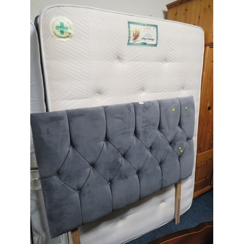 910 - A DOUBLE BED AND HEADBOARD