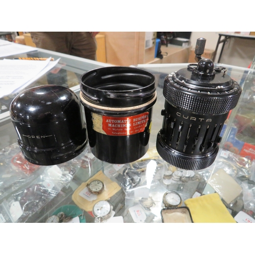 230 - A BOXED METAL CASED CURTA CALCULATOR