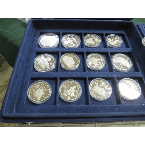145 - CHINA - A COLLECTION OF MODERN SILVER PROOF 5 AND 10 YUAN COINS, in a blue presentation box (25 coin... 