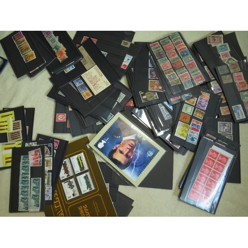 152 - THREE ALBUMS OF FIRST DAY COVERS, together with three boxes of loose stamps and loose sleeves of sta... 