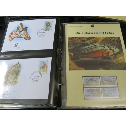 153 - TWELVE ALBUMS OF STAMPS / FIRST DAY COVERS, world wildlife 1983 to 2003, together with a bag of loos... 