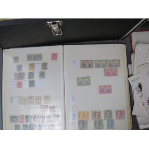 177 - FOUR STAMP ALBUMS / STOCKBOOKS CONTAINING MAINLY SPANISH STAMPS, together with a collection of first... 