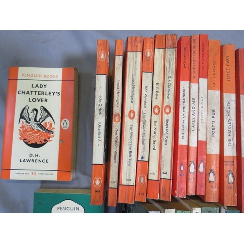 189 - ONE TRAY OF VINTAGE PENGUIN PAPERBACK BOOKS, orange and green (69)