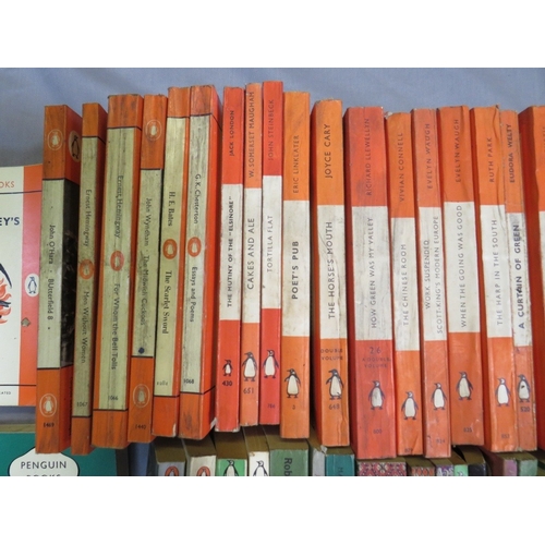 189 - ONE TRAY OF VINTAGE PENGUIN PAPERBACK BOOKS, orange and green (69)