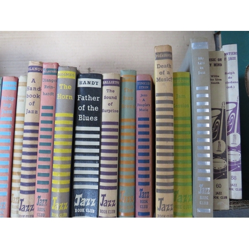 232 - A TRAY CONTAINING APPROXIMATLEY THIRTY NINE VINTAGE HARDBACK JAZZ BOOK CLUB BOOKS, mainly from the 1... 