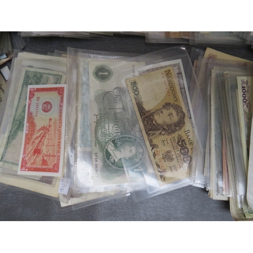 239 - A JOB LOT OF VINTAGE FOREIGN BANKNOTES