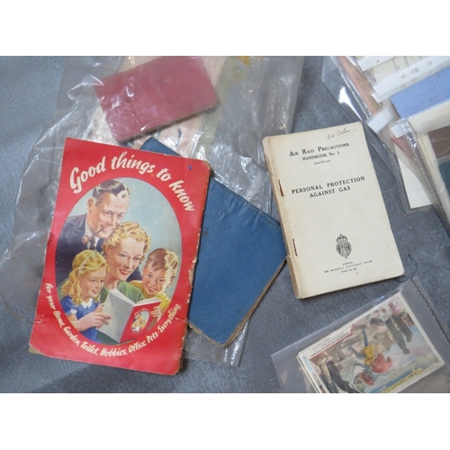 206 - A TRAY OF VINTAGE EPHEMERA, to include photographs, postcards, collectors cards, deeds, sheet music,... 