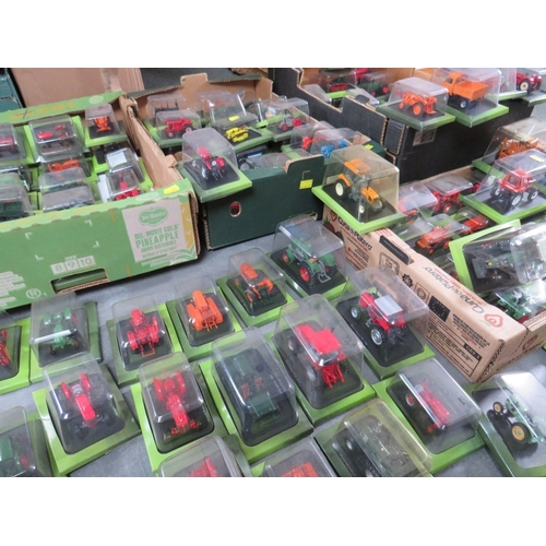 438 - APPROXIMATLEY 140 HACHETTE 1:43 SCALE DIE CAST MODEL FARM TRACTORS, with tub of associated catalogue... 