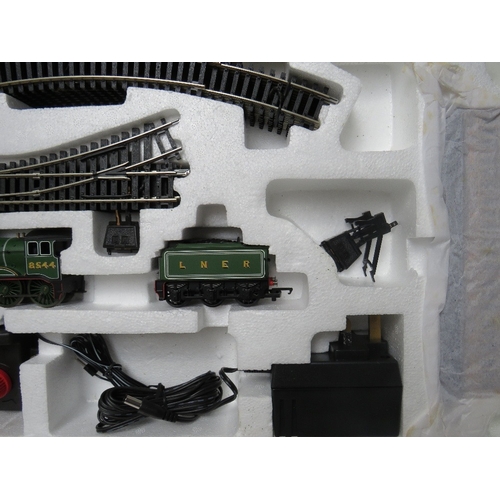 391 - A BOXED HORNBY '00' GAUGE MAINLINE ELECTRIC TRAIN SET, comprising LNER 4-6-0 locomotive, two coaches... 