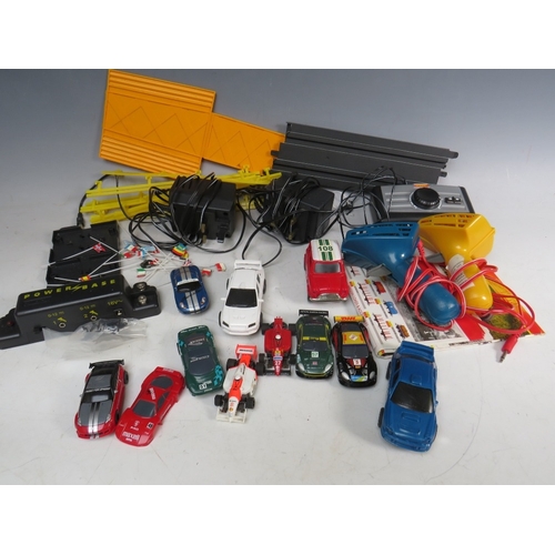 439 - A BOXED MICRO SCALEXTRIC, with track, cars, transformer and hand controls, together with a box of mi... 