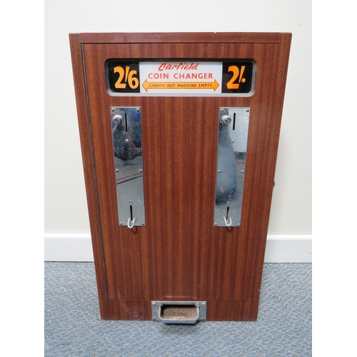 520 - A VINTAGE CARFIELD WALL MOUNTED ARCADE COIN CHANGER MACHINE, wood case with chrome fittings, slots f... 