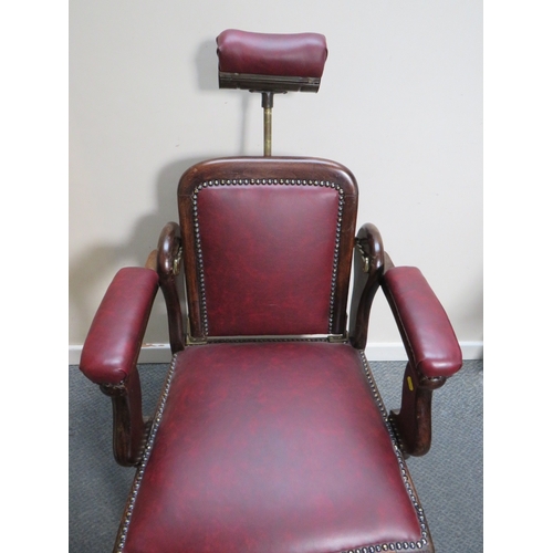 510 - A LATE VICTORIAN BARBERS / DENTISTS CHAIR, with upholstered mahogany frame, adjustable centrifugal p... 