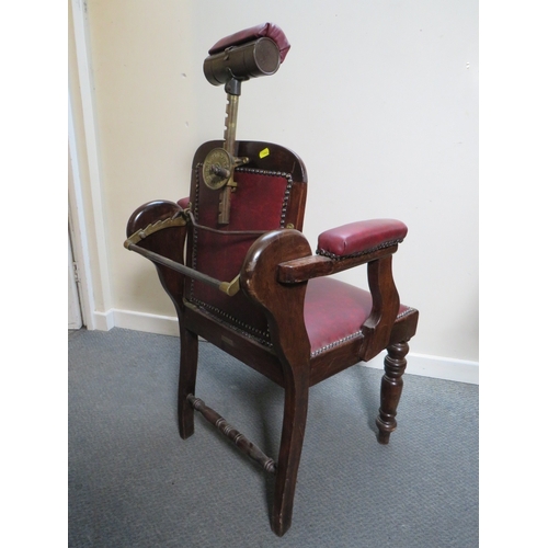 510 - A LATE VICTORIAN BARBERS / DENTISTS CHAIR, with upholstered mahogany frame, adjustable centrifugal p... 