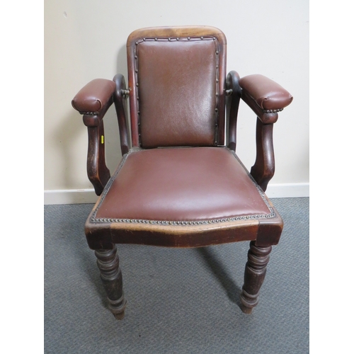 511 - A LATE VICTORIAN BARBERS / DENTISTS CHAIR, with upholstered mahogany frame, with reclining back rest... 