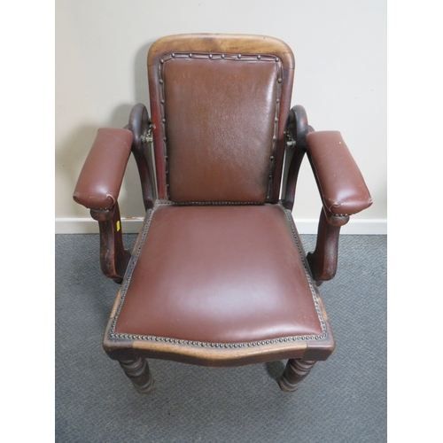 511 - A LATE VICTORIAN BARBERS / DENTISTS CHAIR, with upholstered mahogany frame, with reclining back rest... 