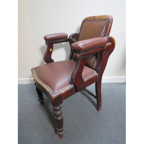 511 - A LATE VICTORIAN BARBERS / DENTISTS CHAIR, with upholstered mahogany frame, with reclining back rest... 