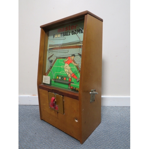 523 - MASTERMATIC 'MASTER FOOTBALL' WALL MOUNTED PENNY SLOT MACHINE, in wooden case with glazed front, H 6... 