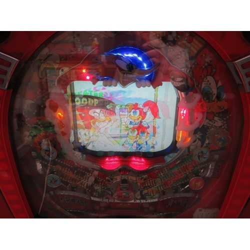 524 - A VINTAGE JAPANESE ? WALL MOUNTED ELECTRICAL WOODY WOODPECKER ARCADE PINBALL MACHINE, with key and b... 