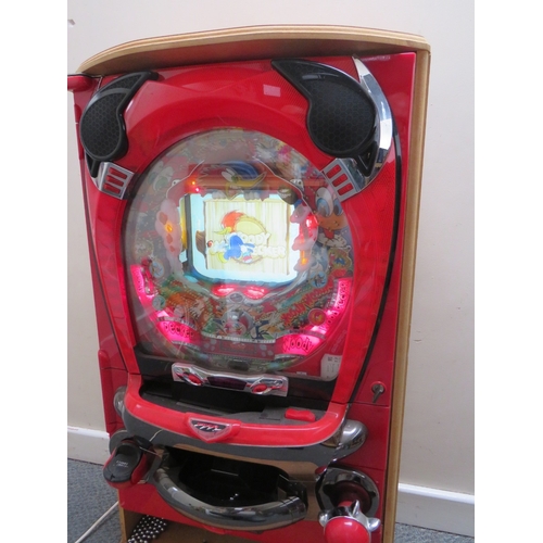 524 - A VINTAGE JAPANESE ? WALL MOUNTED ELECTRICAL WOODY WOODPECKER ARCADE PINBALL MACHINE, with key and b... 