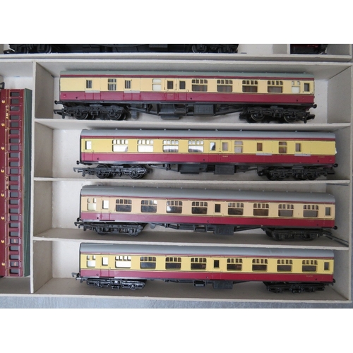 394 - A BOX CONTAINING SIXTEEN 00 GAUGE CARRIAGES, by Mainline, Airfix etc