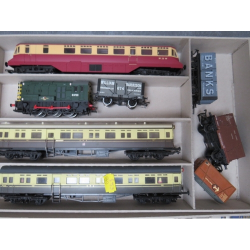 395 - A BOX CONTAINING 00 GAUGE HORNBY DIESEL LOCOMOTIVE, Bachmann Shunter, five carriages by Hornby, Airf... 