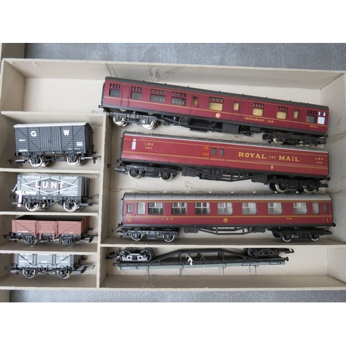 395 - A BOX CONTAINING 00 GAUGE HORNBY DIESEL LOCOMOTIVE, Bachmann Shunter, five carriages by Hornby, Airf... 