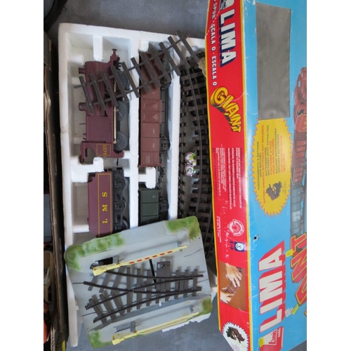 450 - A BOXED LIMA GIANT BATTERY OPERATED TRAIN SET 100160, together with two trays of toys to include fou... 