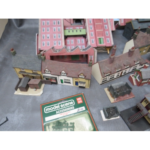 399 - THREE BOXES OF 00 GAUGE BUILDINGS, both plastic and card, together with 00 gauge model station build... 