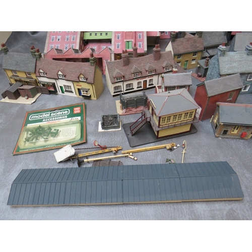 399 - THREE BOXES OF 00 GAUGE BUILDINGS, both plastic and card, together with 00 gauge model station build... 