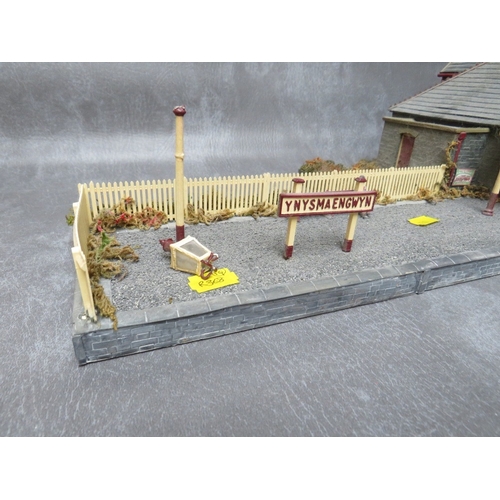 399 - THREE BOXES OF 00 GAUGE BUILDINGS, both plastic and card, together with 00 gauge model station build... 