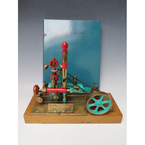 382 - A POPCORN ENGINE ON WOODEN PLINTH, with build instructions / plans