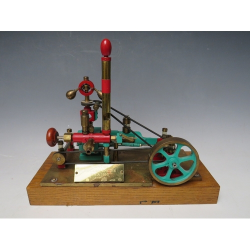 382 - A POPCORN ENGINE ON WOODEN PLINTH, with build instructions / plans