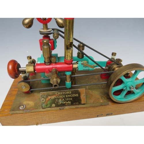 382 - A POPCORN ENGINE ON WOODEN PLINTH, with build instructions / plans