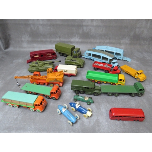 A TRAY CONTAINING NINETEEN UNBOXED DINKY VEHICLES, to include two Pullmore car transporters, Cheiftain tank, 20 ton lorry mounted crane, horsebox, striker, Leyland Comet, Leyland Octopus, Bedford Foden and Guy lorries, Ferrari Talbot Lago and Cooper Bristol racing cars etc.